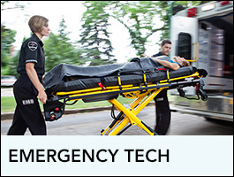 Programs EMT showing two techs putting a person in a ambulance