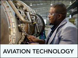 Aviation Maintenance Program Mechanic working on a plane