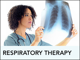 Respiratory Therapist reviewing an x-ray