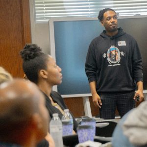 A speaker from the Men of Color Conference